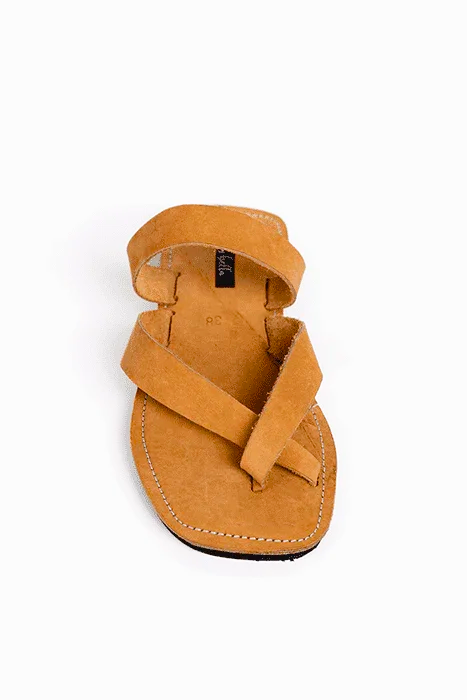 Image of handmade tan leather sandals with cross strap produced by Australian brand Miriam Bella
