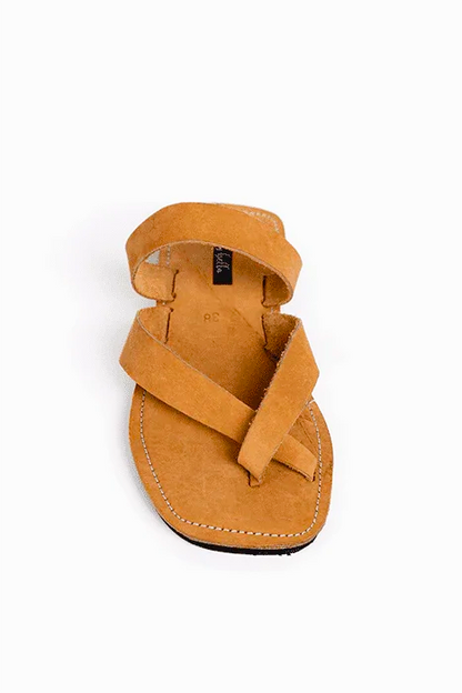 Image of handmade tan leather sandals with cross strap produced by Australian brand Miriam Bella