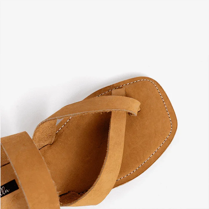 Image of handmade tan leather sandals with cross strap produced by Australian brand Miriam Bella