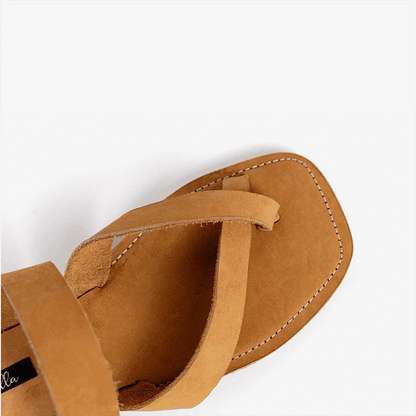 Image of handmade tan leather sandals with cross strap produced by Australian brand Miriam Bella