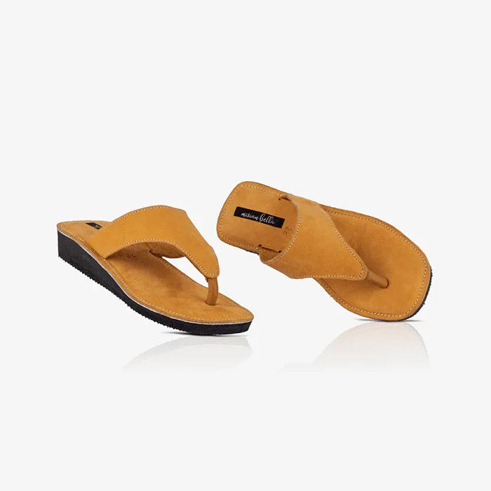 Image of a pair of women's leather slides with wedge heel, produced by Australian brand Miriam Bella