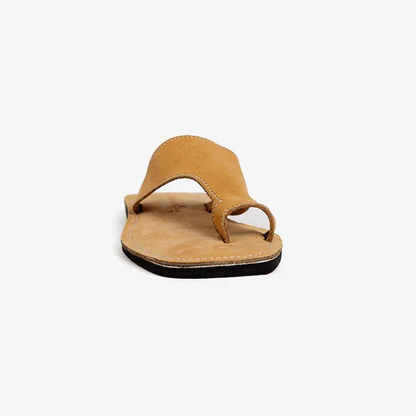 tan leather thong sandals, produced by Australian brand Miriam Bella