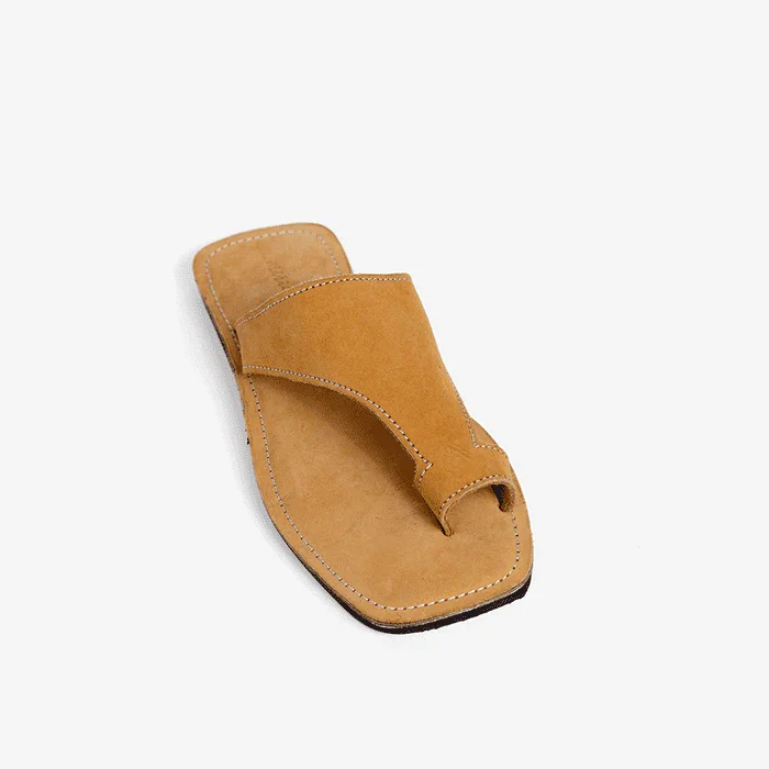 Tan leather thong sandals, produced by Australian brand Miriam Bella