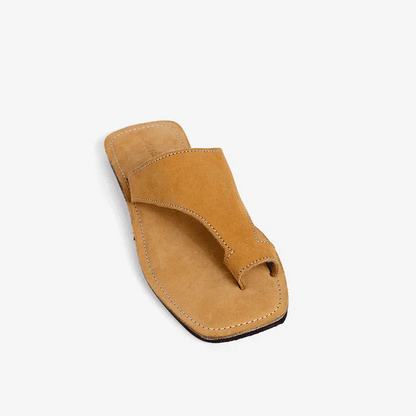 Tan leather thong sandals, produced by Australian brand Miriam Bella