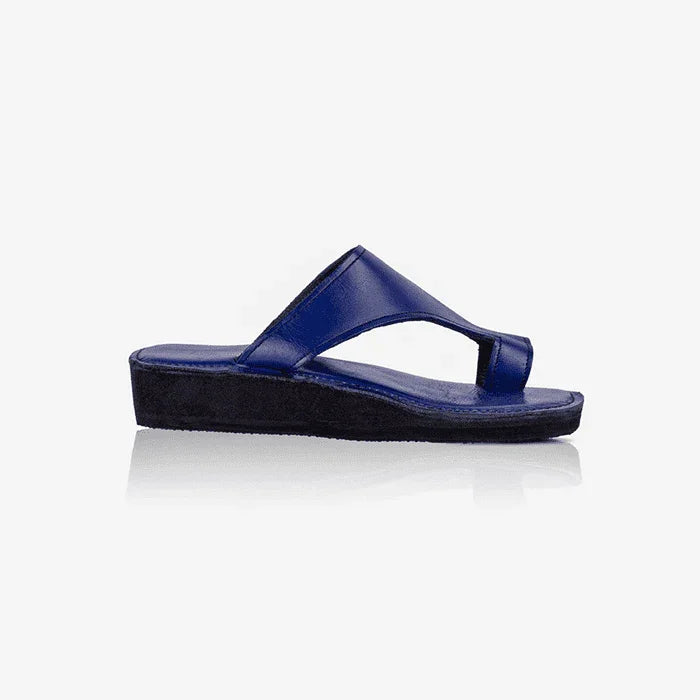 Image of blue leather thong sandals, produced by Australian brand Miriam Bella