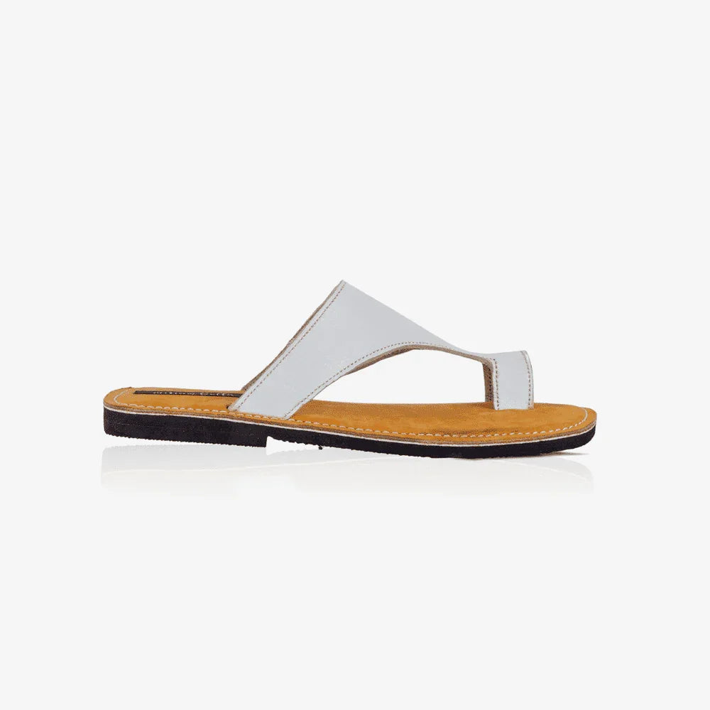 Image of white leather thong sandals, produced by Australian brand Miriam Bella