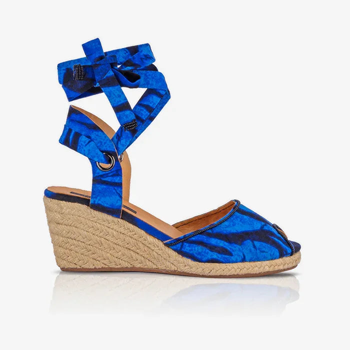 Single Gaia Ocean Spirit espadrille wedge sandal with blue printed canvas and jute wedge.