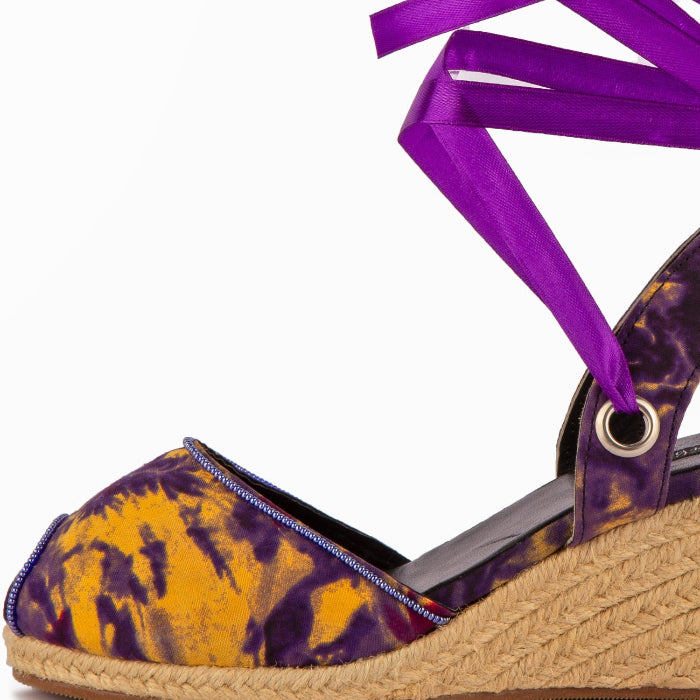 Gaia Royal Ember espadrille wedge sandals with a purple ribbon on a white background