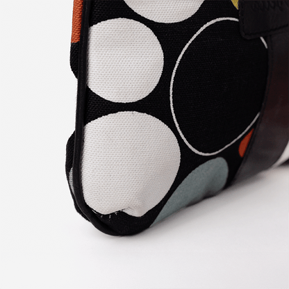 Close-up of the Black Print Mini Tote Bag for Women, a fabric pouch with circular patterns on a white background