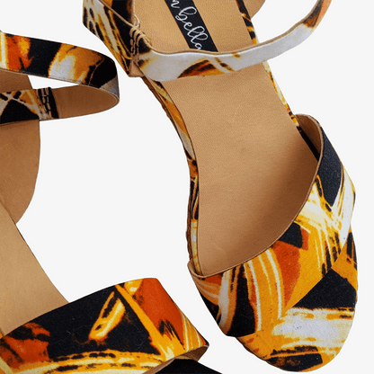 High-heeled shoes with a colorful abstract design on a white background
