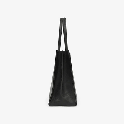 Black leather tote bag on a white background