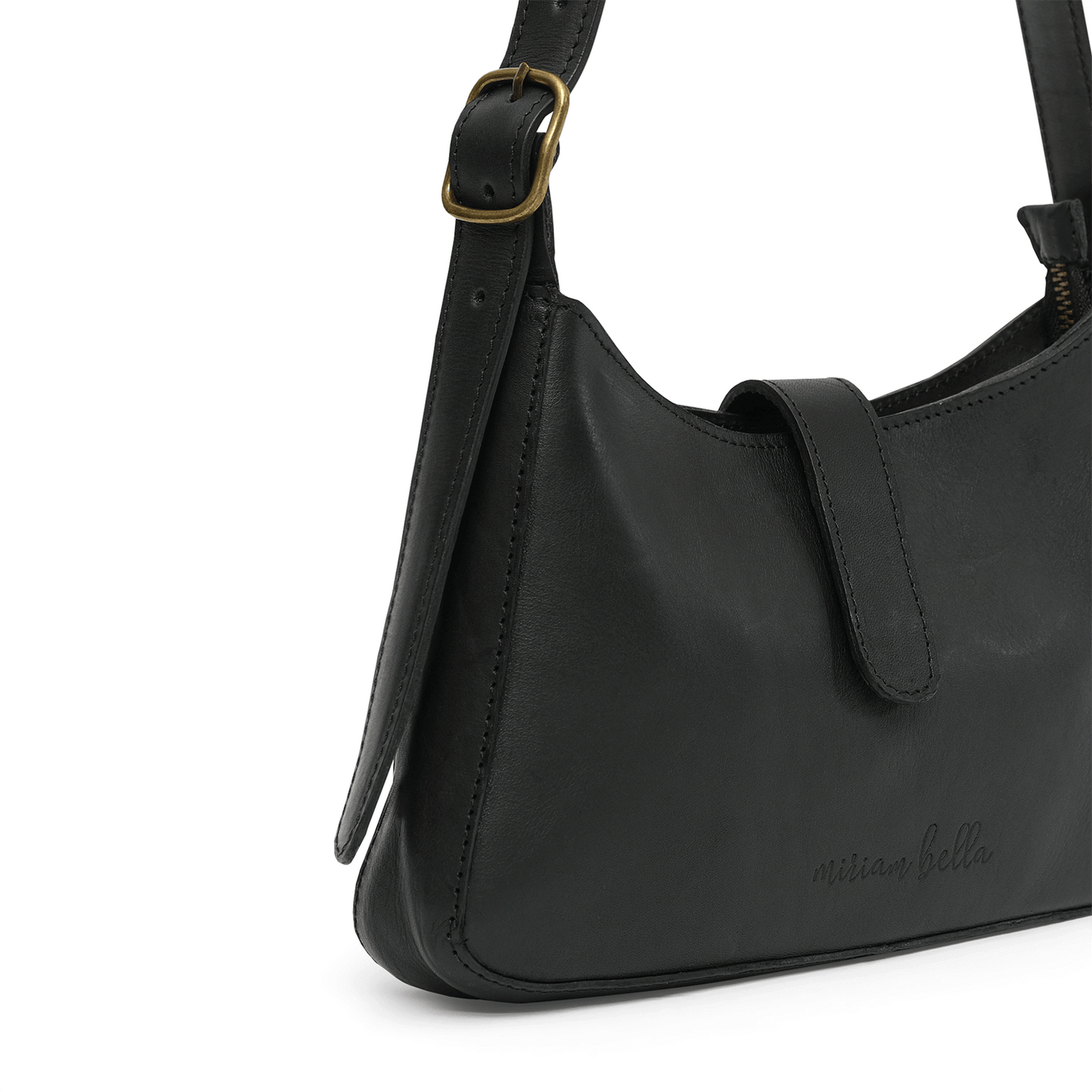 A black leather mini shoulder bag with gold buckle on a white background