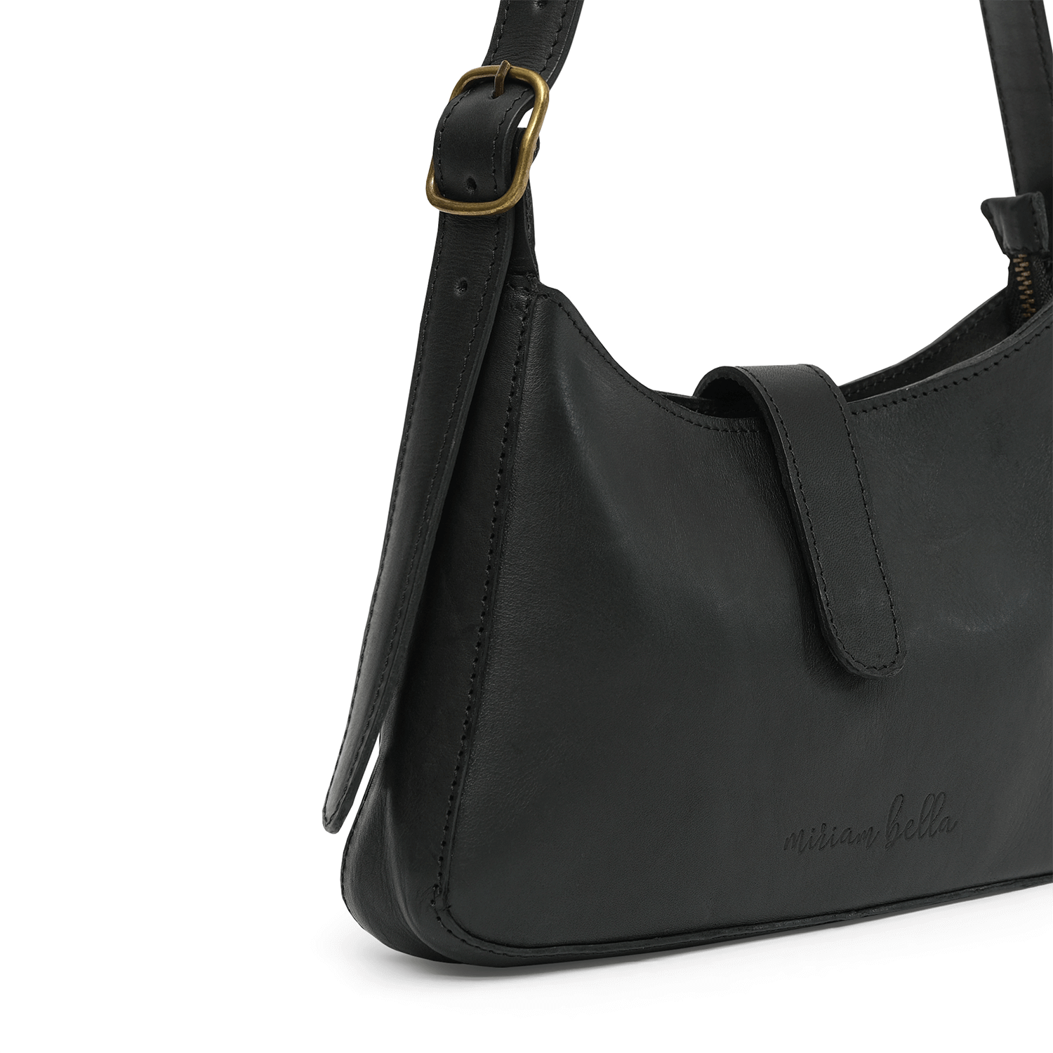 A black leather mini shoulder bag with gold buckle on a white background